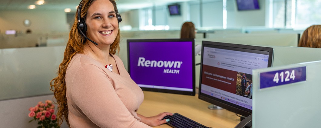 Call center representative working at desk