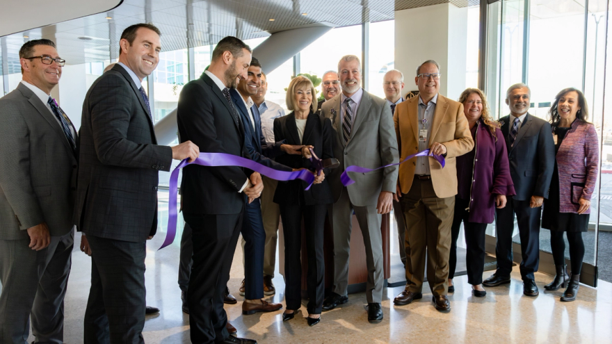Group of leaders at Renown Health cut ribbon for new care center