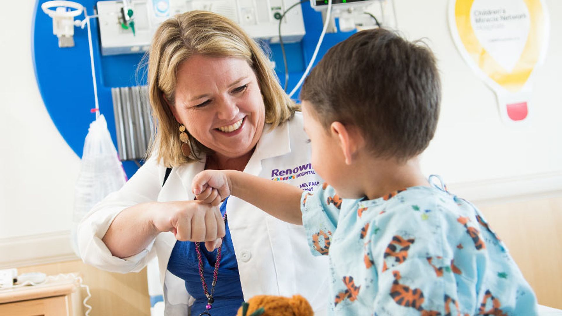 Renown pediatrician with little patient