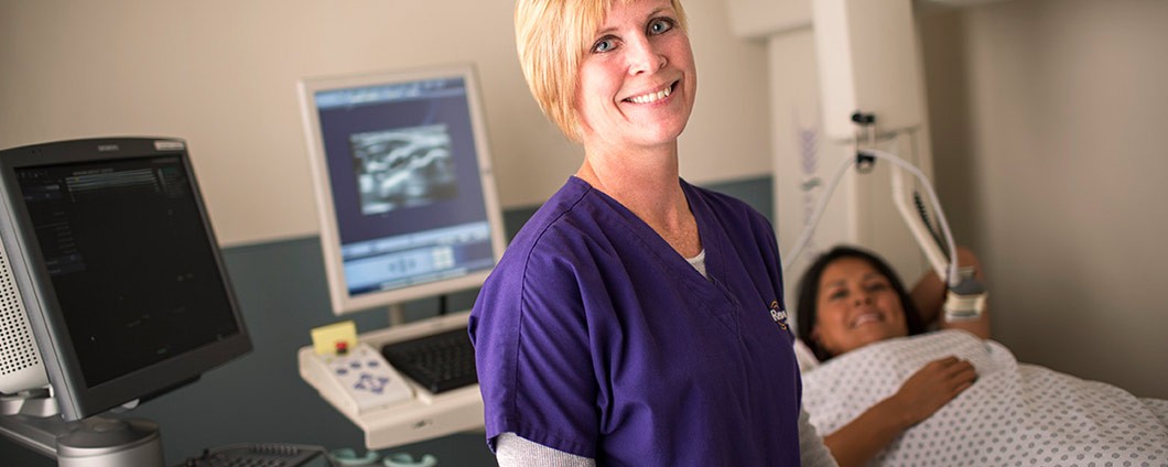 Renown imaging technician assisting patient prior to scan
