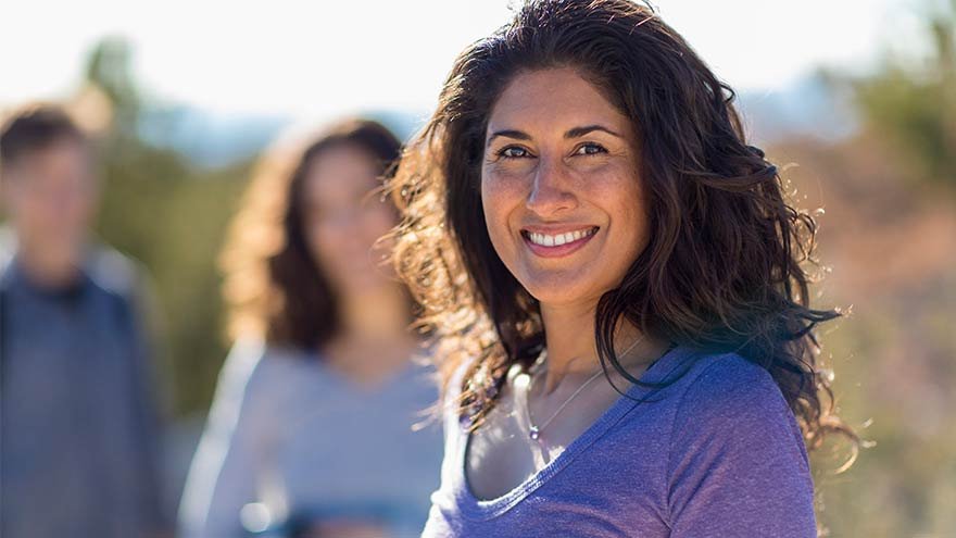 Hispanic woman outdoors hiking