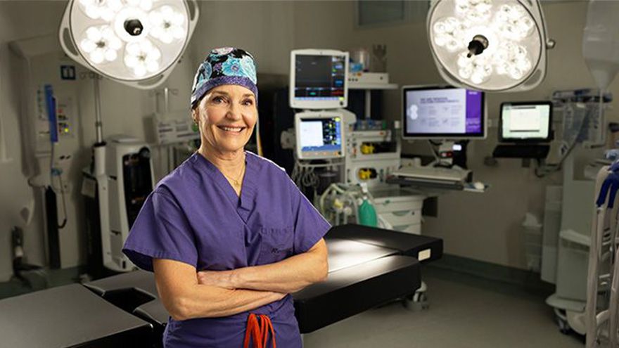 Renown Gastroenterologist posing in operating room