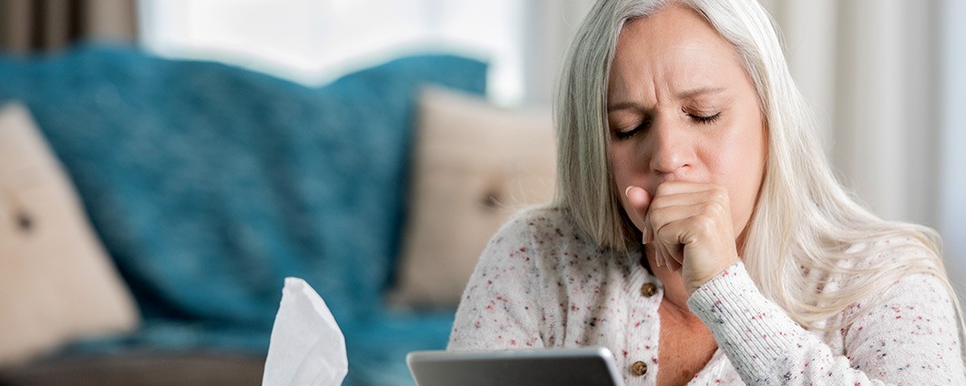 Woman searching symptoms on her tablet