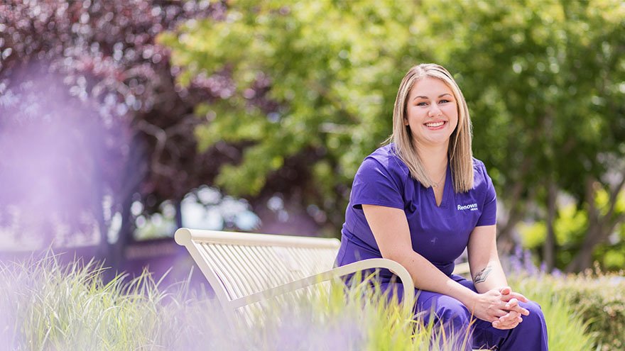 Renown nurse Haley Carroll sitting outside