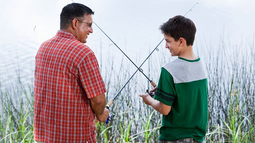 A man and a child fishing