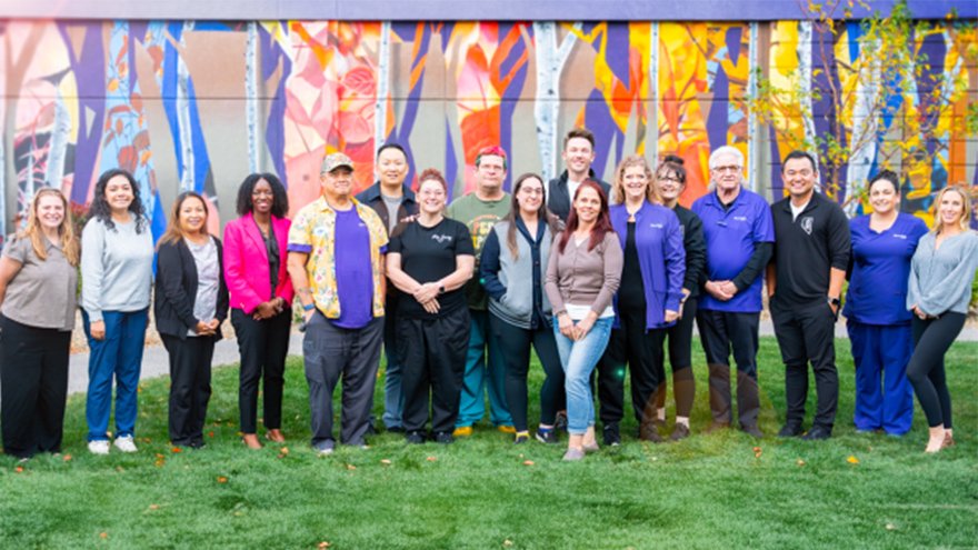 Dedicated team members of the Crisis Care Center posing for a photo