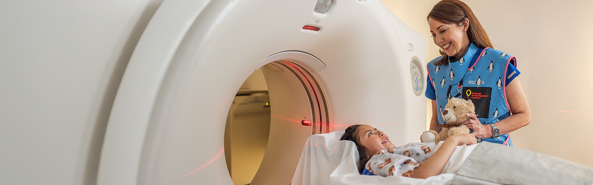Renown provider assists child during an MRI procedure
