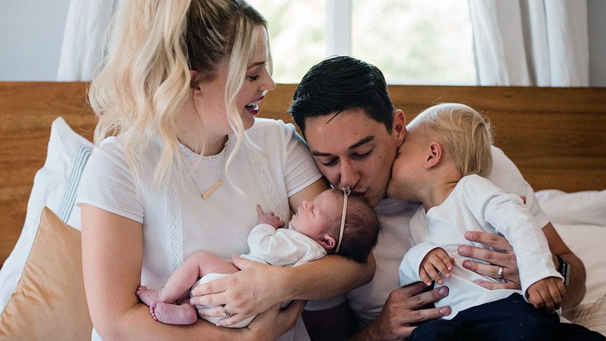 A couple with two children