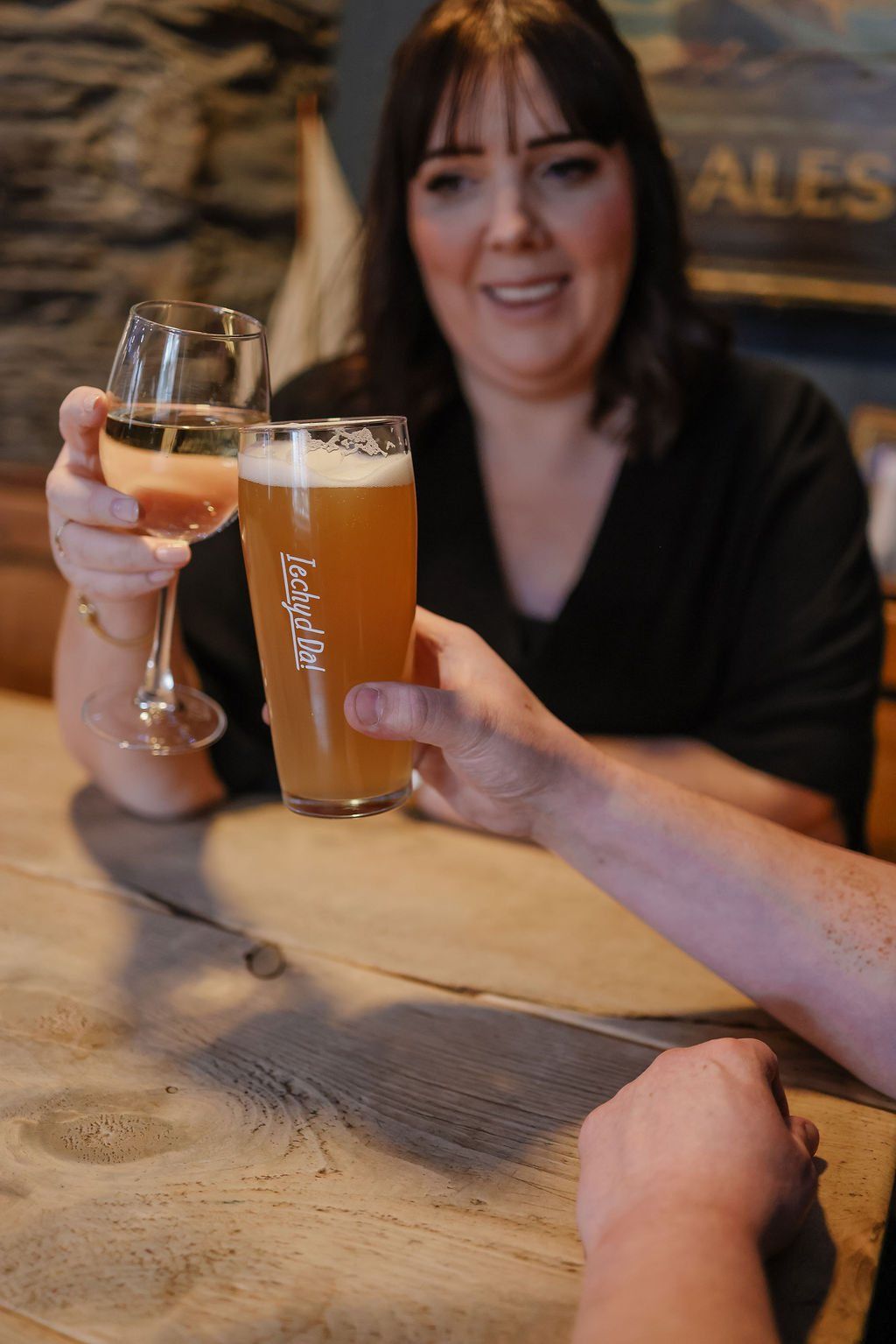 Friends raising a glass together