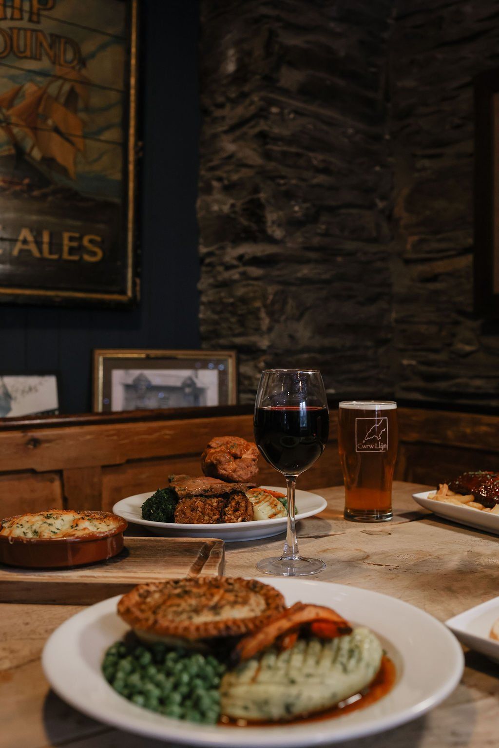 Steak and ale pie with mash and peas
