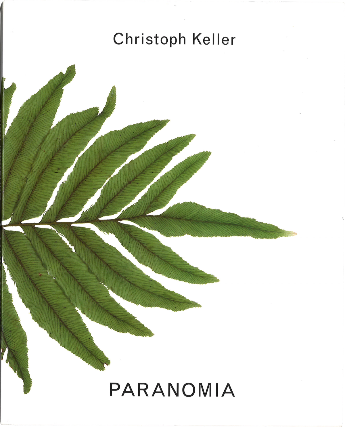 Scan of the cover of a book. White background with a large green fern leaf. Title and name are set in black type.