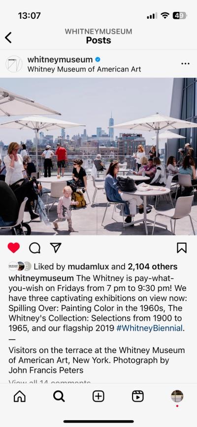 Screenshot of an instagram post featuring the Whitney terrace with tables and umbrellas and people sitting by the tables