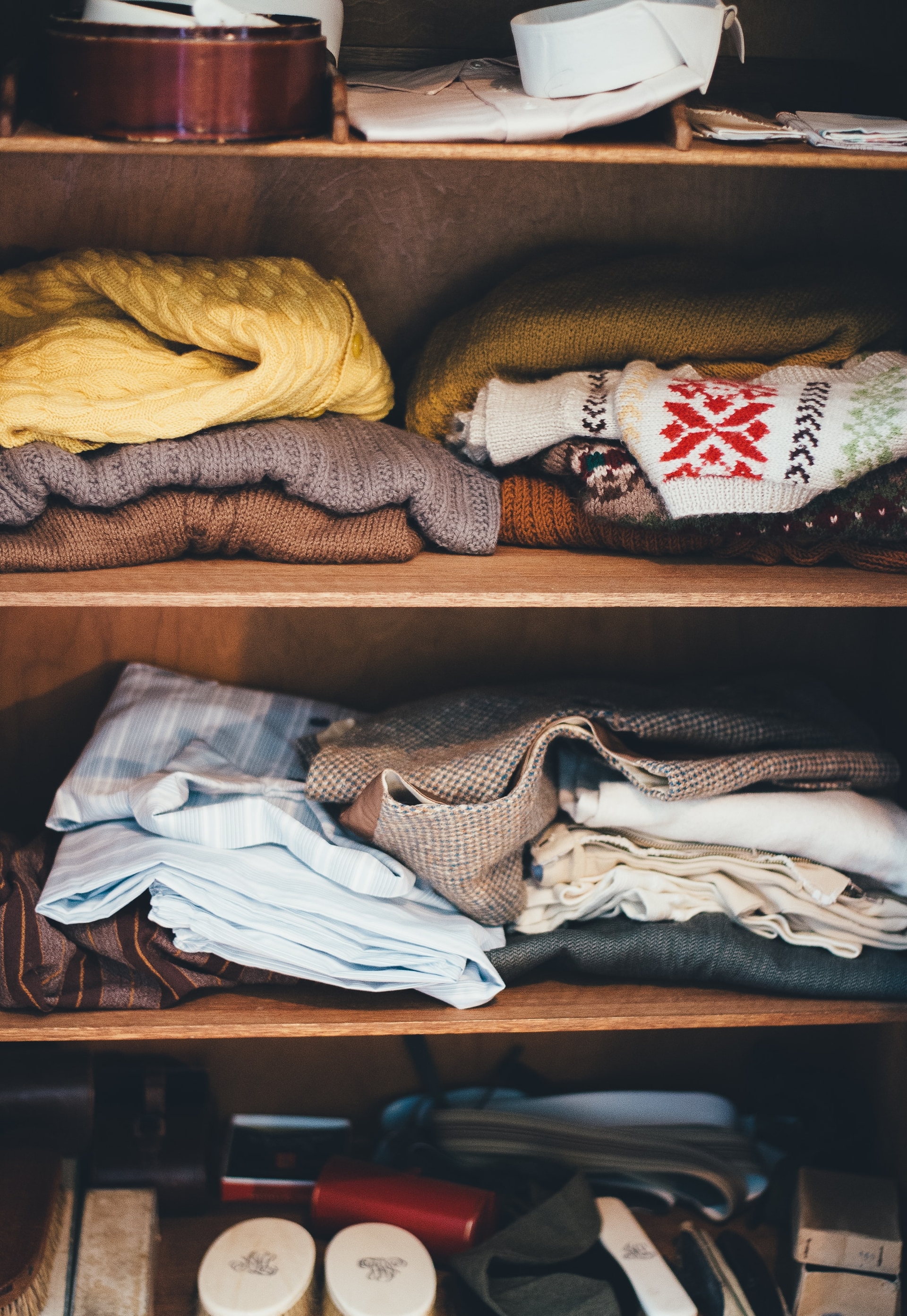 clothes folded on shelves