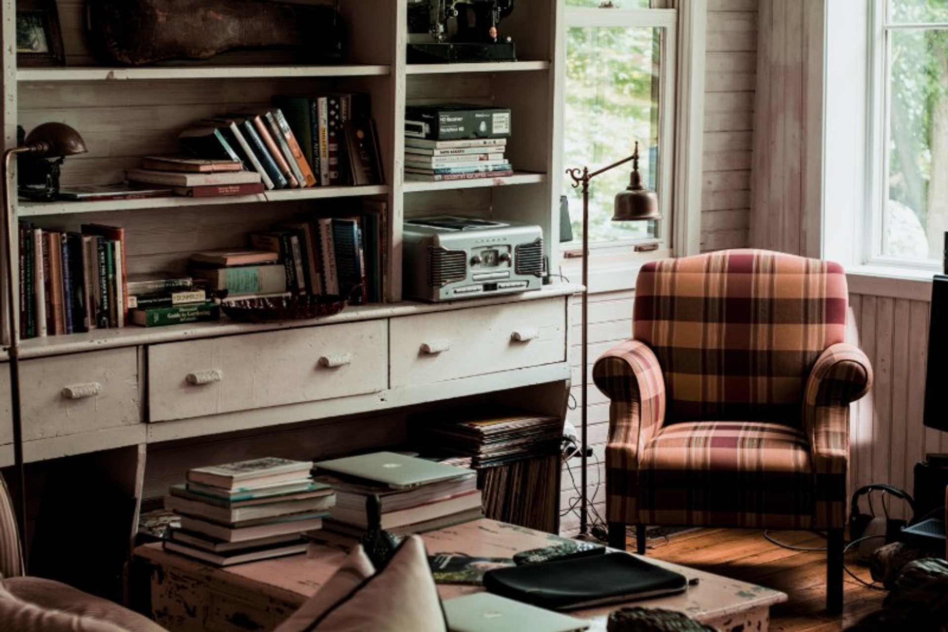 Cosy study with bookshelves and an arnchair