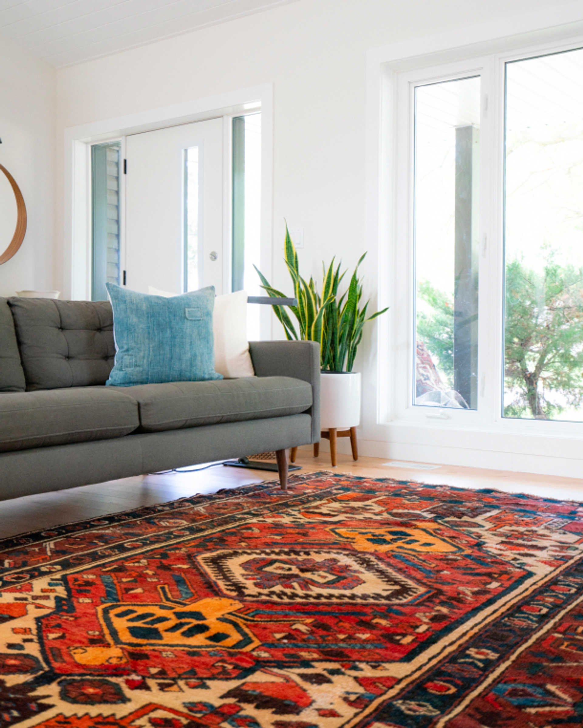 modern living room with brightly covered rug