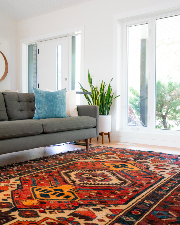 modern living room with brightly covered rug