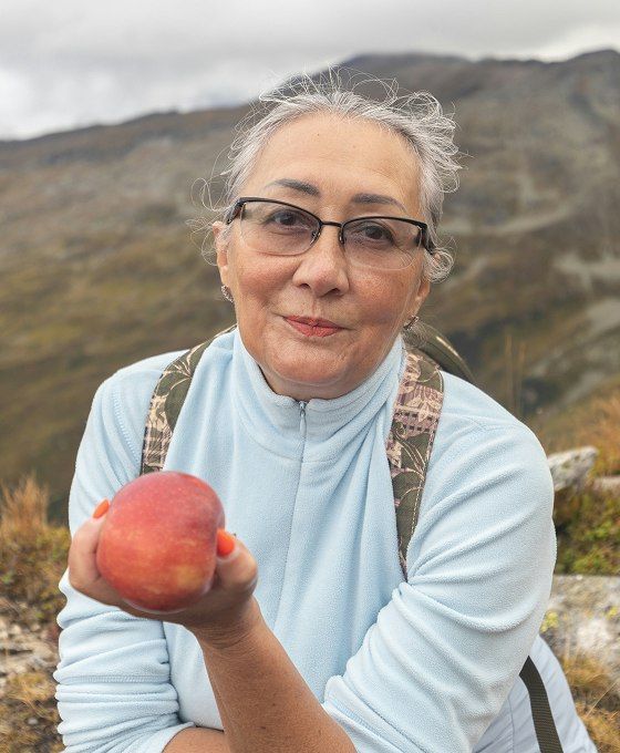 Hiking senior with snack