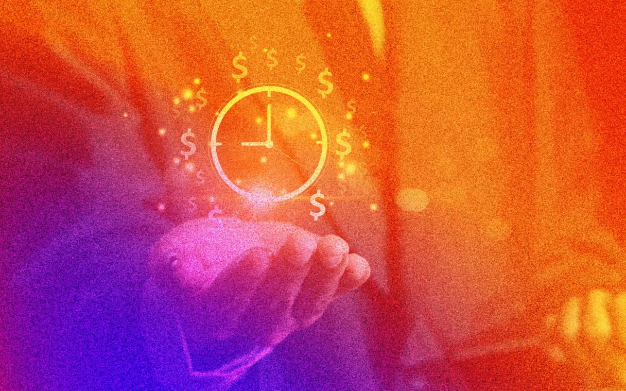Hand holding clock