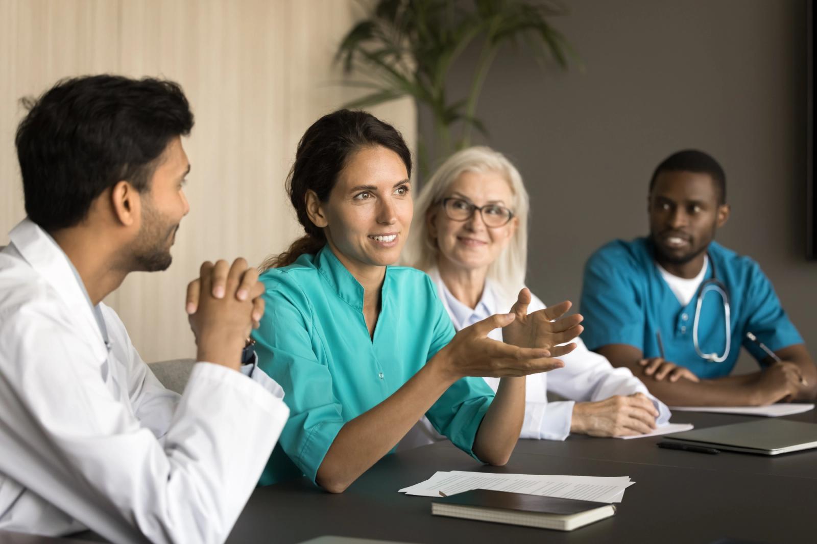 A consultant providing at-the-elbow support to clinical staff