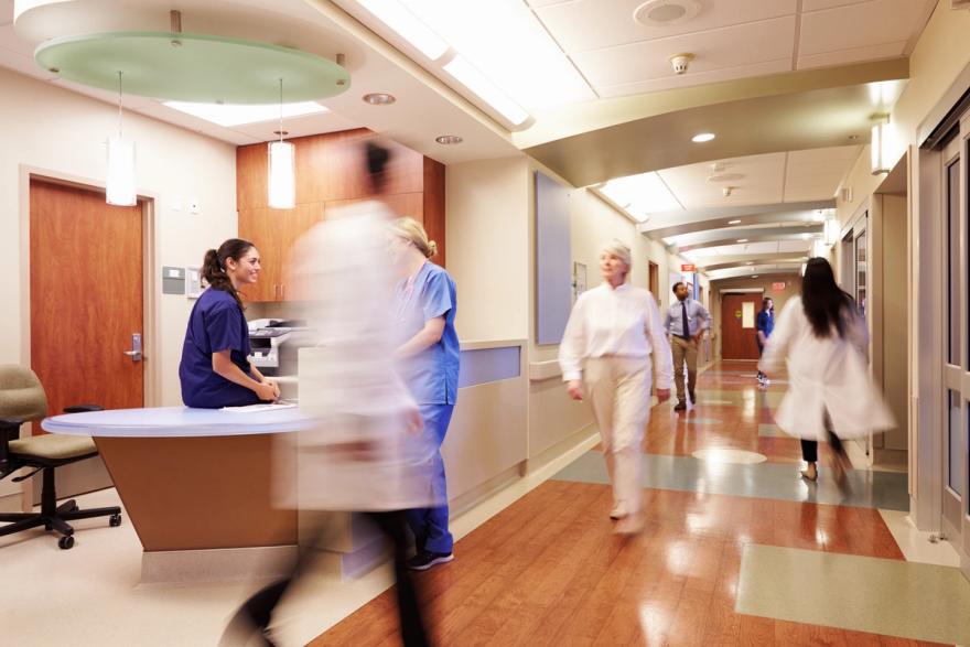 A busy nurses' station in a modern hospital