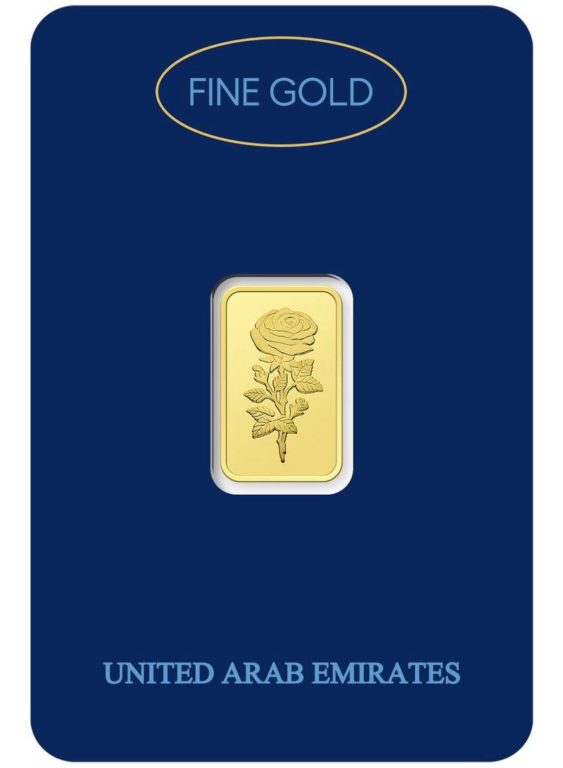 An elegantly crafted fine gold bar featuring a detailed rose design and presented in premium protective packaging. A refined choice for gold investment, memorable gifting, celebrations, and precious metal collections.