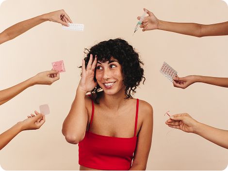 An overwhelmed woman surrounded by six hands each holding various birth control methods.