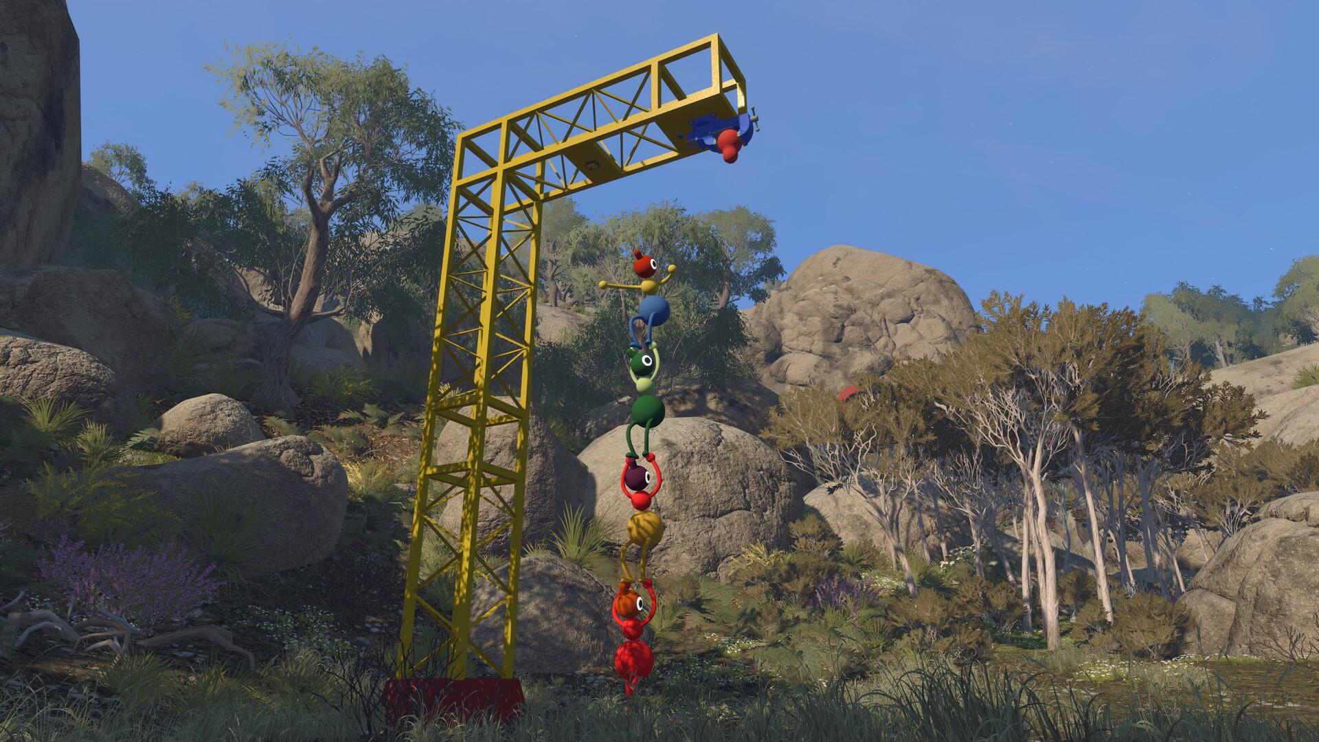 Six Big Walk characters hanging off each other in a chain from a yellow crane arm in the bush