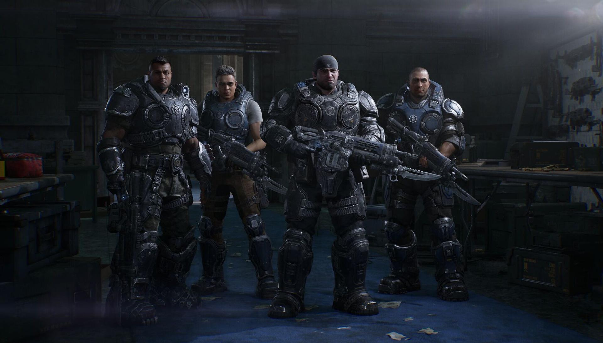Four COG soldiers including a young Marcus Fenix stand armed in a dim armoury in Gears of War: E-Day. Official screenshot from The Coalition and Xbox Game Studios.