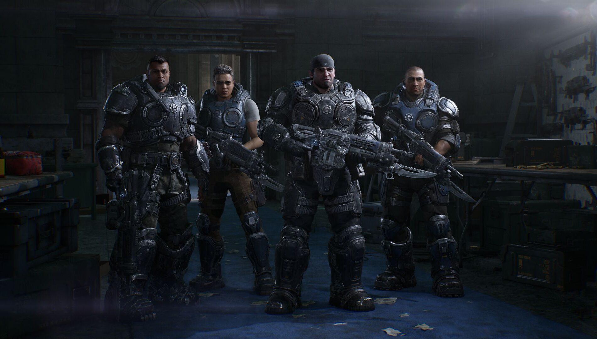 Four COG soldiers including a young Marcus Fenix stand armed in a dim armoury in Gears of War: E-Day. Official screenshot from The Coalition and Xbox Game Studios.