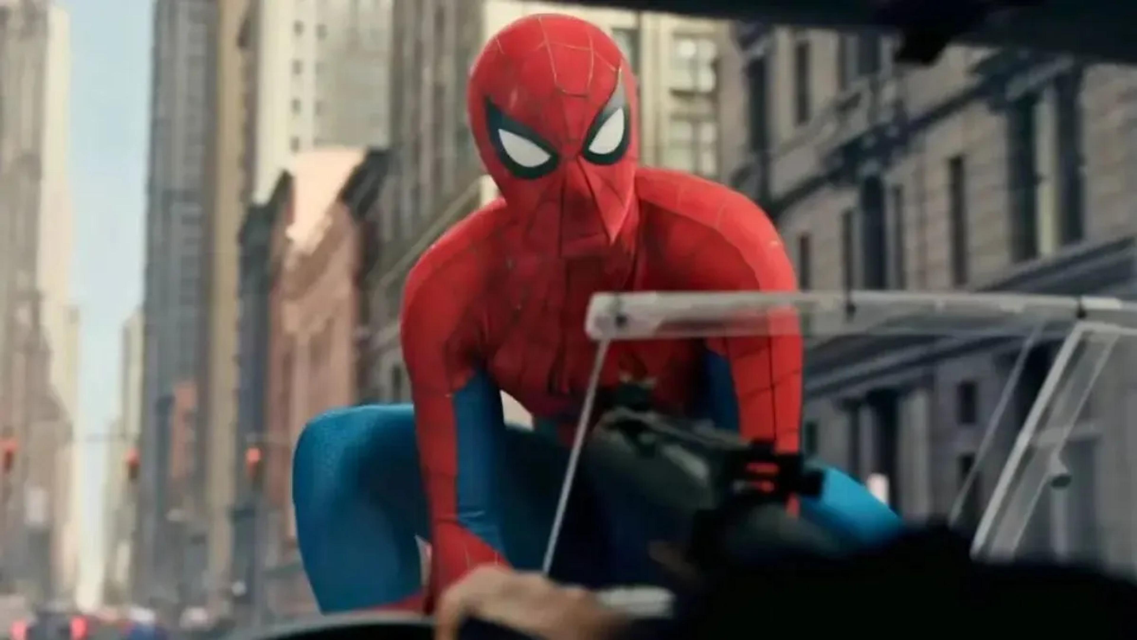 Tom Holland as Spider-Man crouched on a moving vehicle in daylight New York traffic. Still from the Spider-Man: Brand New Day trailer via Sony Pictures.