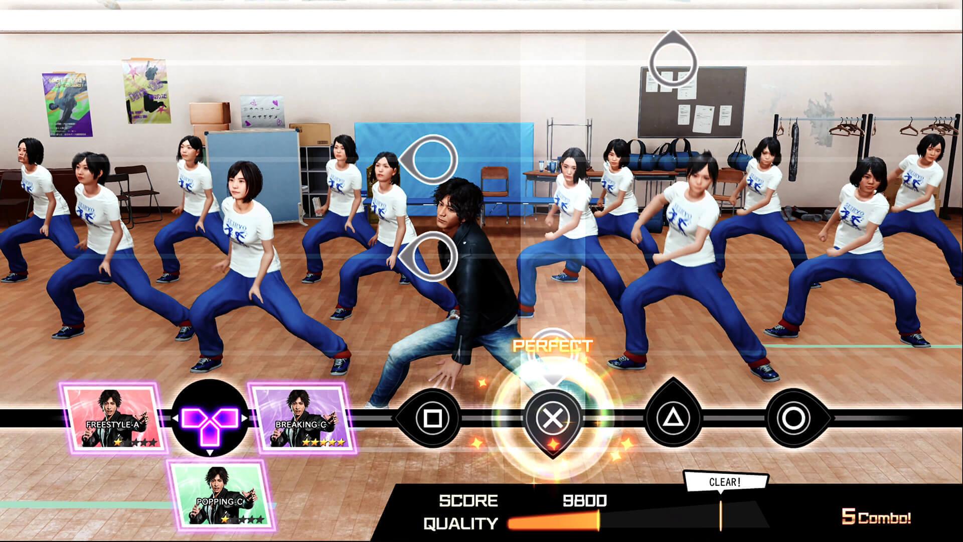 Yagami dances in formation with a school dance team in a practice room, with rhythm game button prompts and a score bar along the bottom