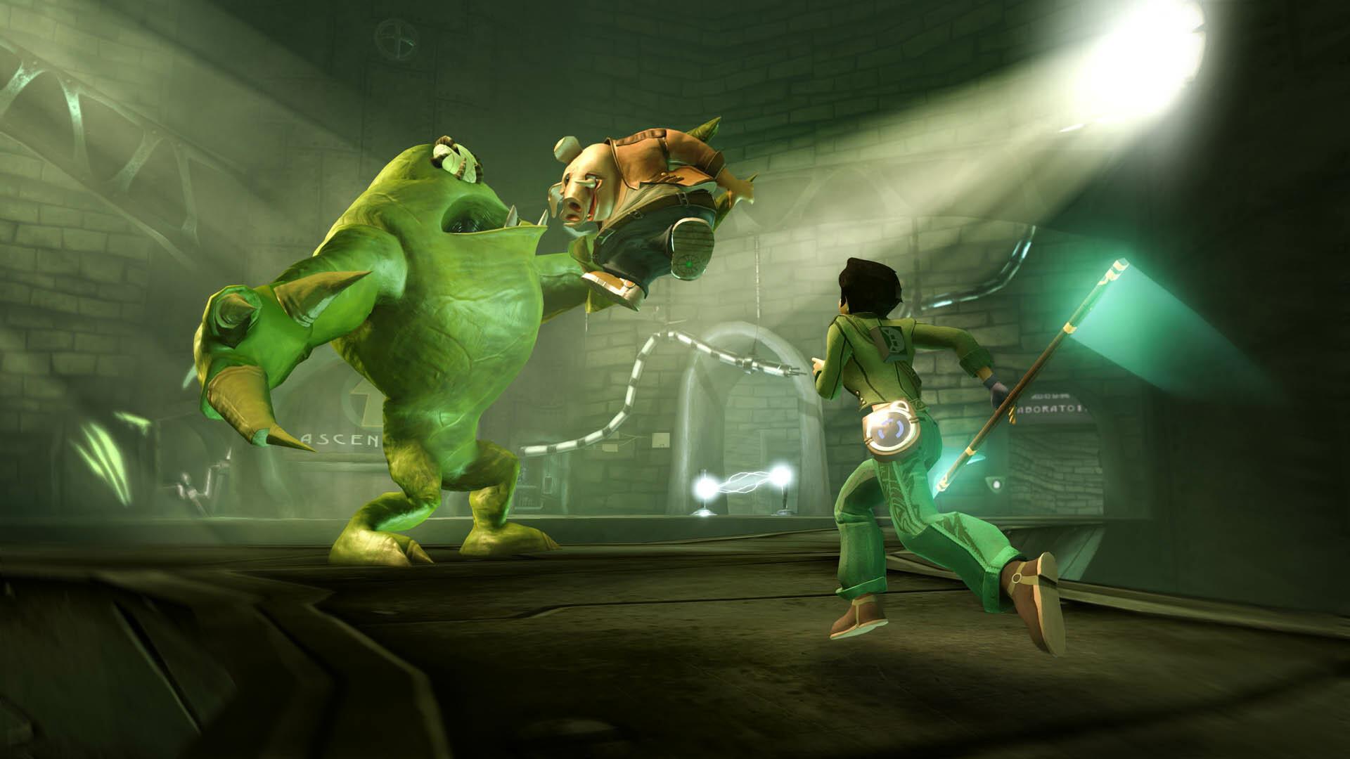 Jade fighting a large green alien creature in a dim industrial interior in Beyond Good and Evil