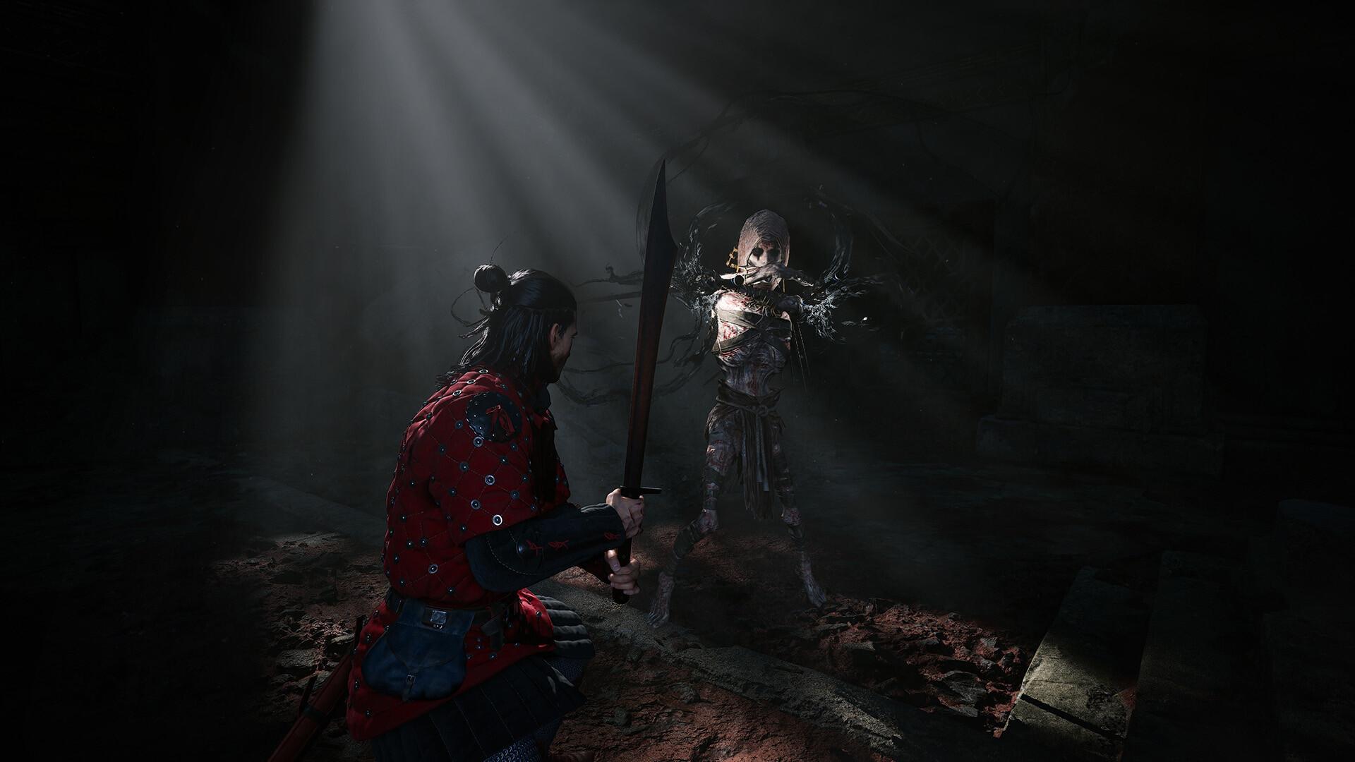 Coen crouched with a drawn sword facing a pale creature of the night in a dark crypt lit by a shaft of light