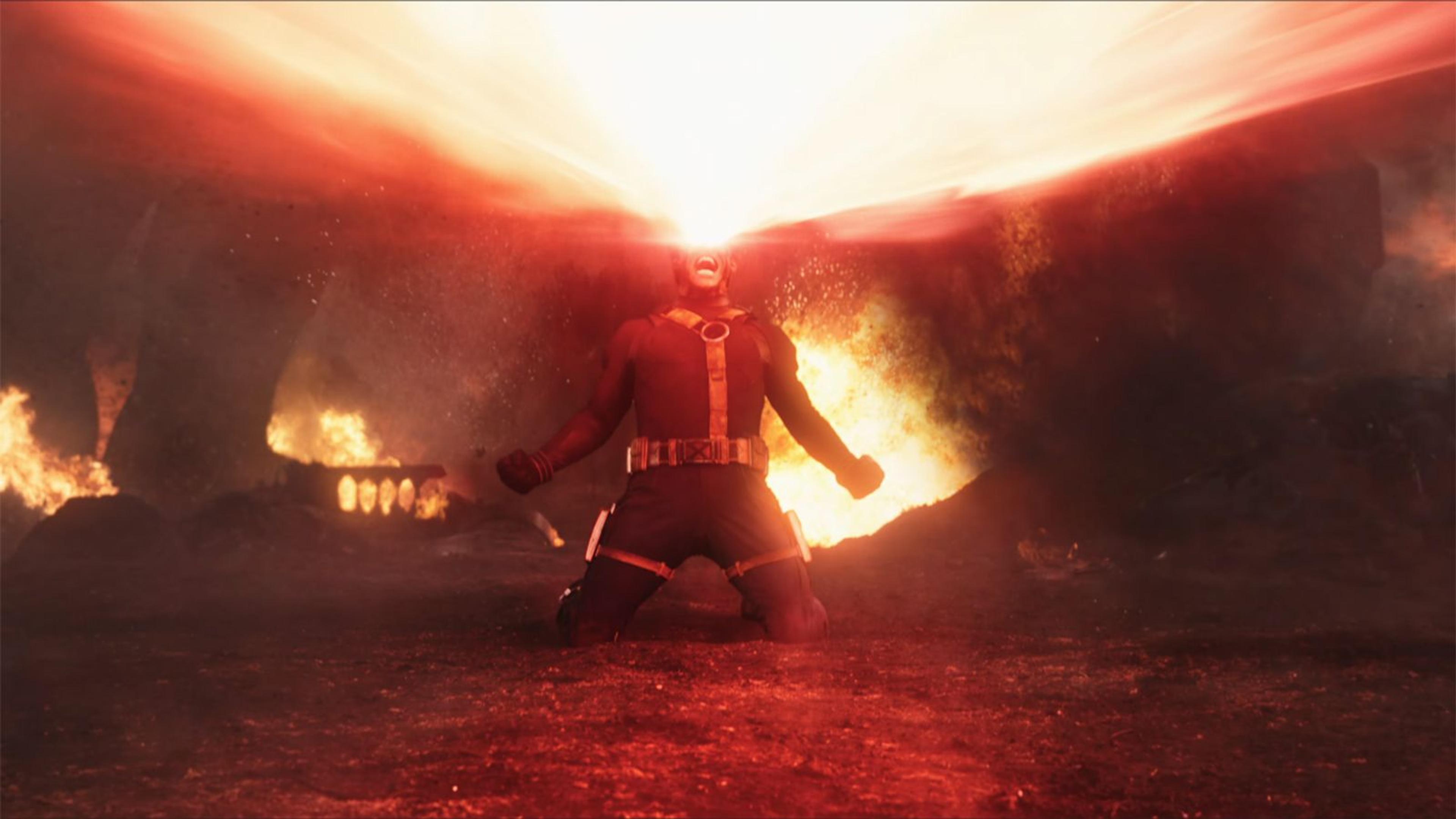 Cyclops on his knees firing a huge optic blast upward, screaming, surrounded by fire and wreckage. Still from the Avengers: Doomsday X-Men teaser via Marvel Studios.