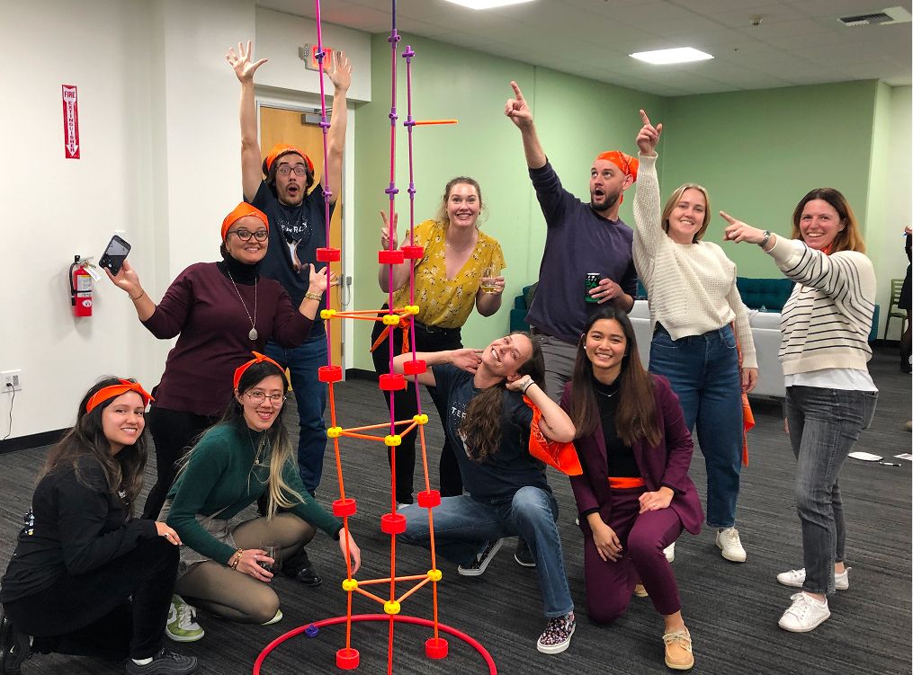 A group of people building something and having fun
