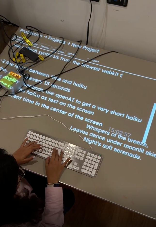 Student Naomi Shah programming the Spatial Pixel lab space. 