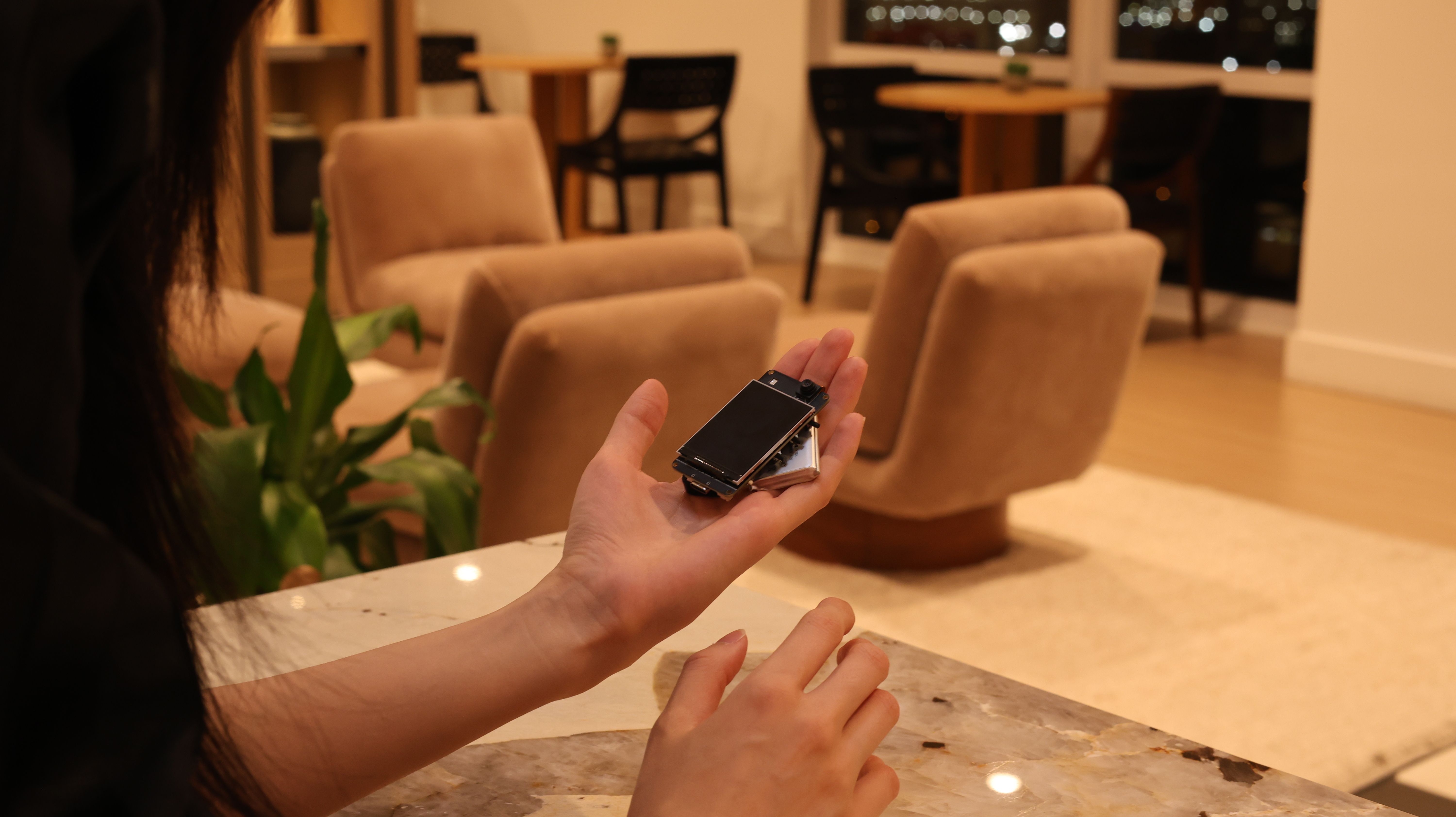 A user testing the Wiser prototype, powered by an Arduino ESP32.