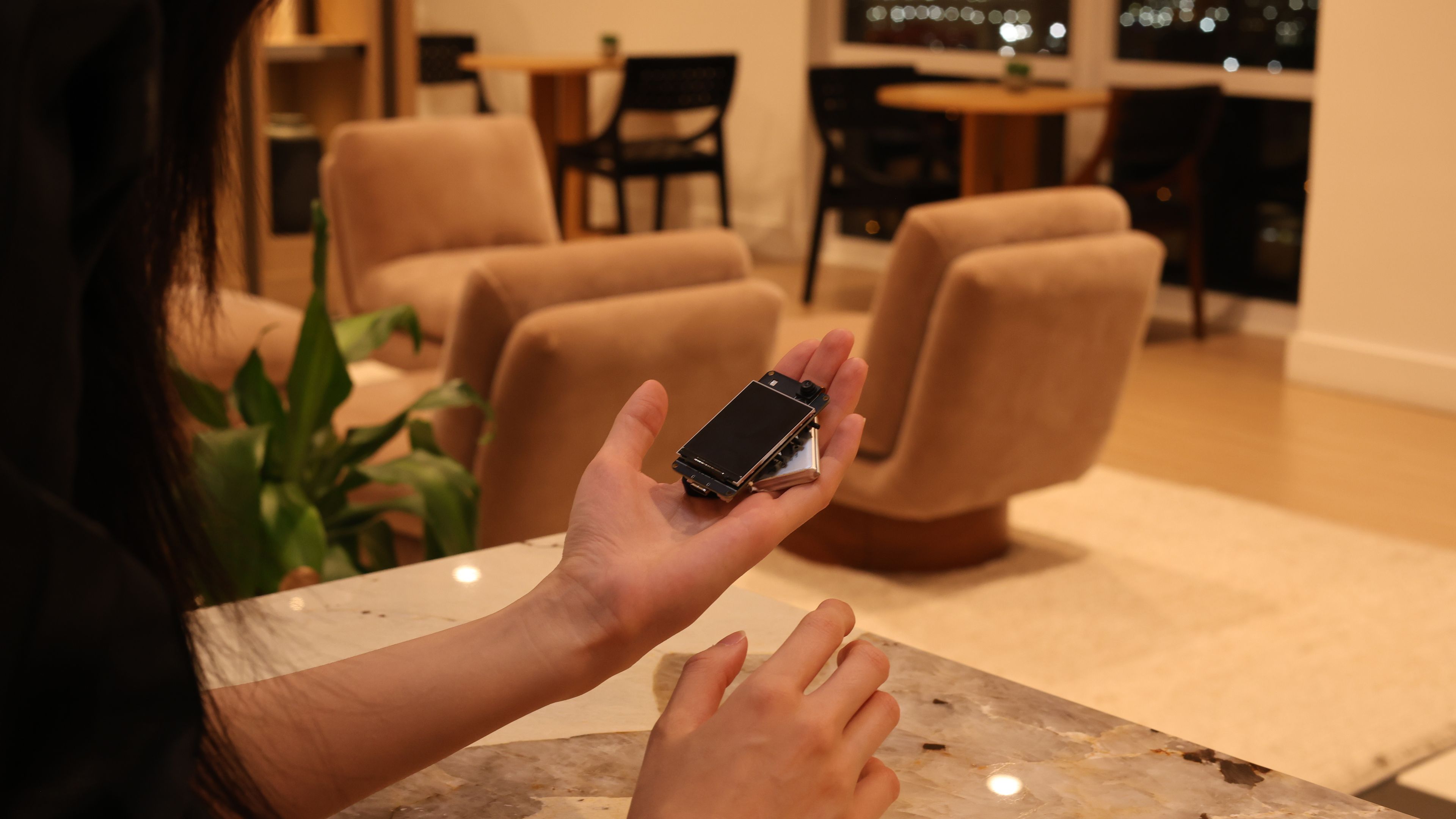 A user testing the Wiser prototype, powered by an Arduino ESP32.