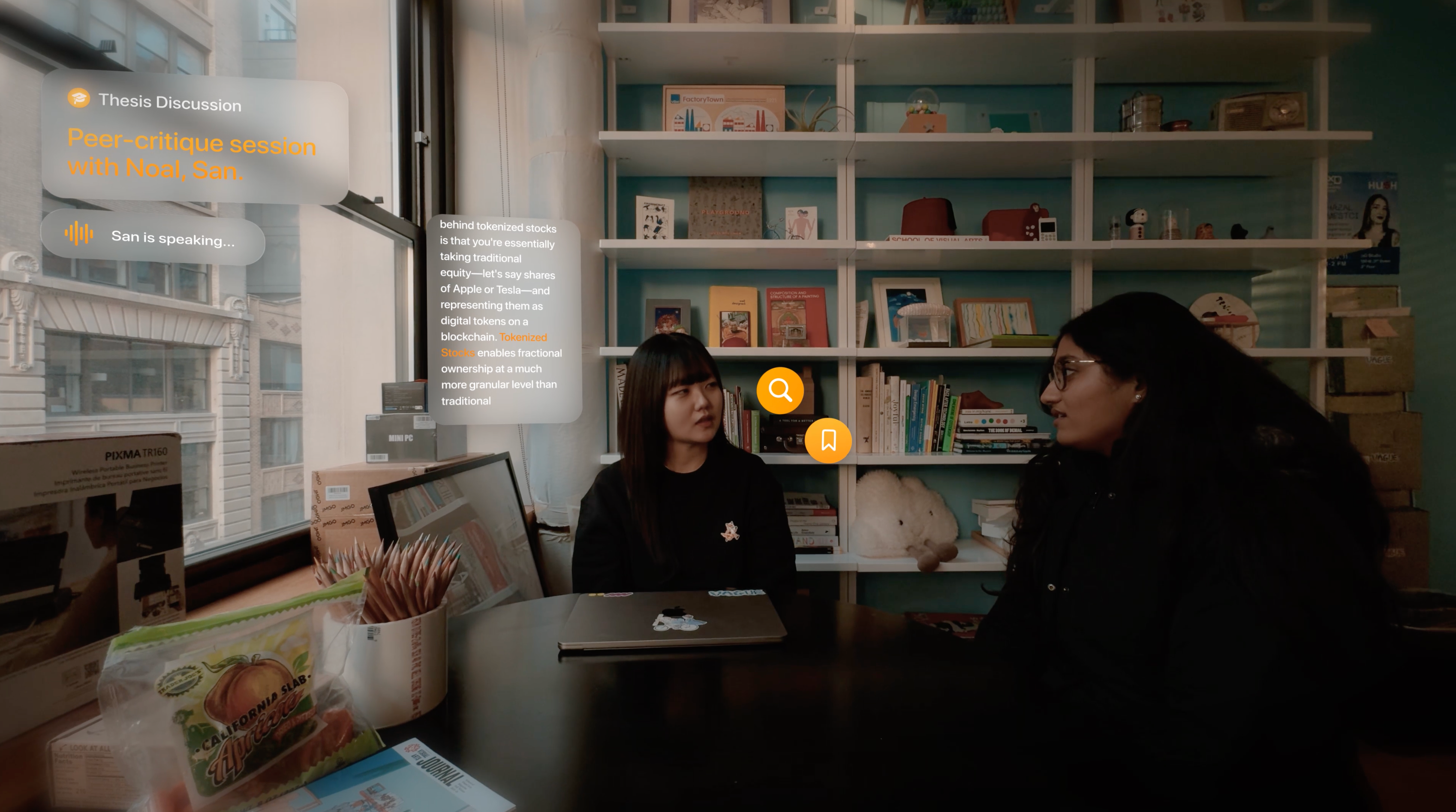 A text interface is overlaid on top of a mixed reality view of two students in conversation.