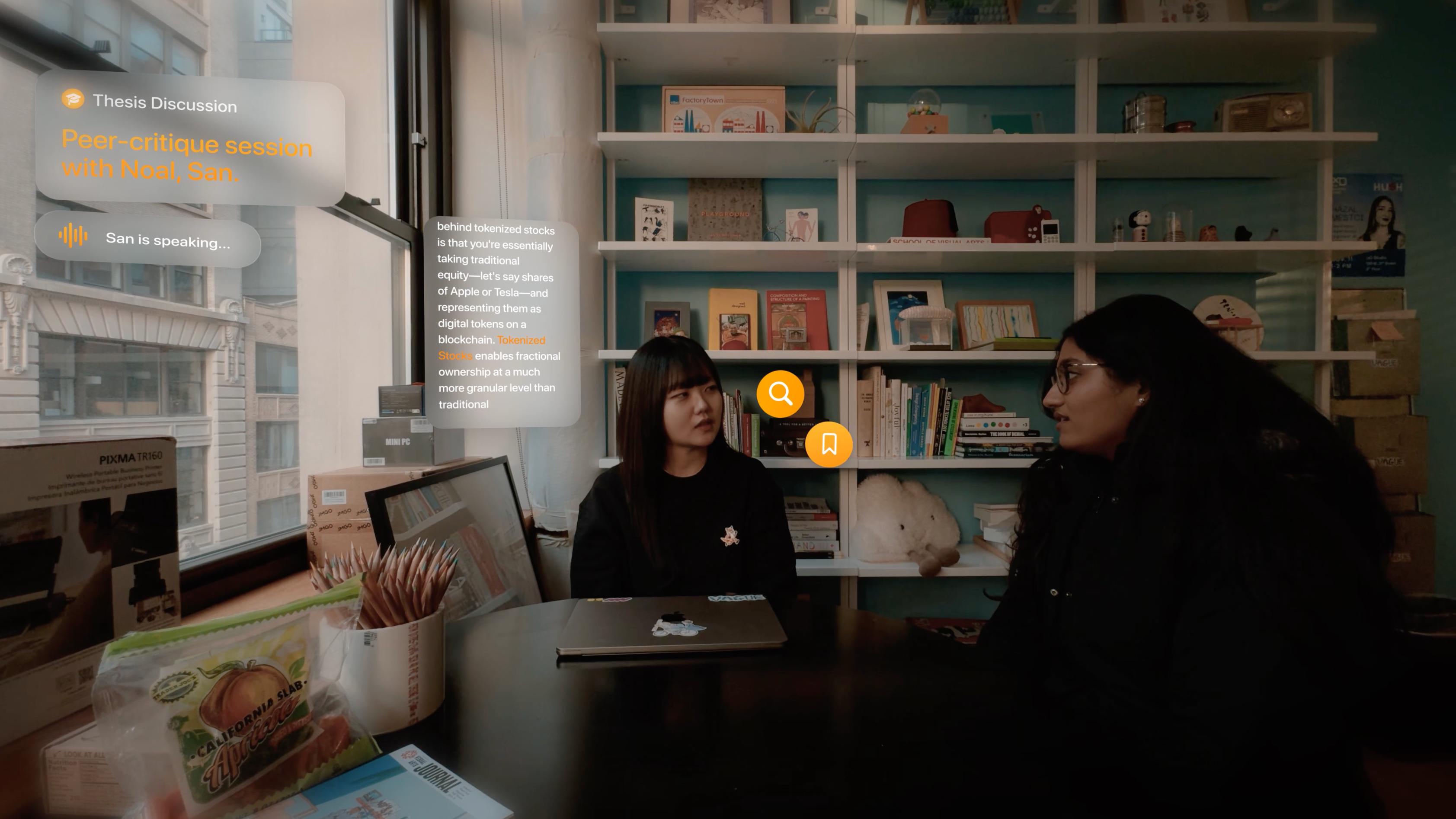 A text interface is overlaid on top of a mixed reality view of two students in conversation.