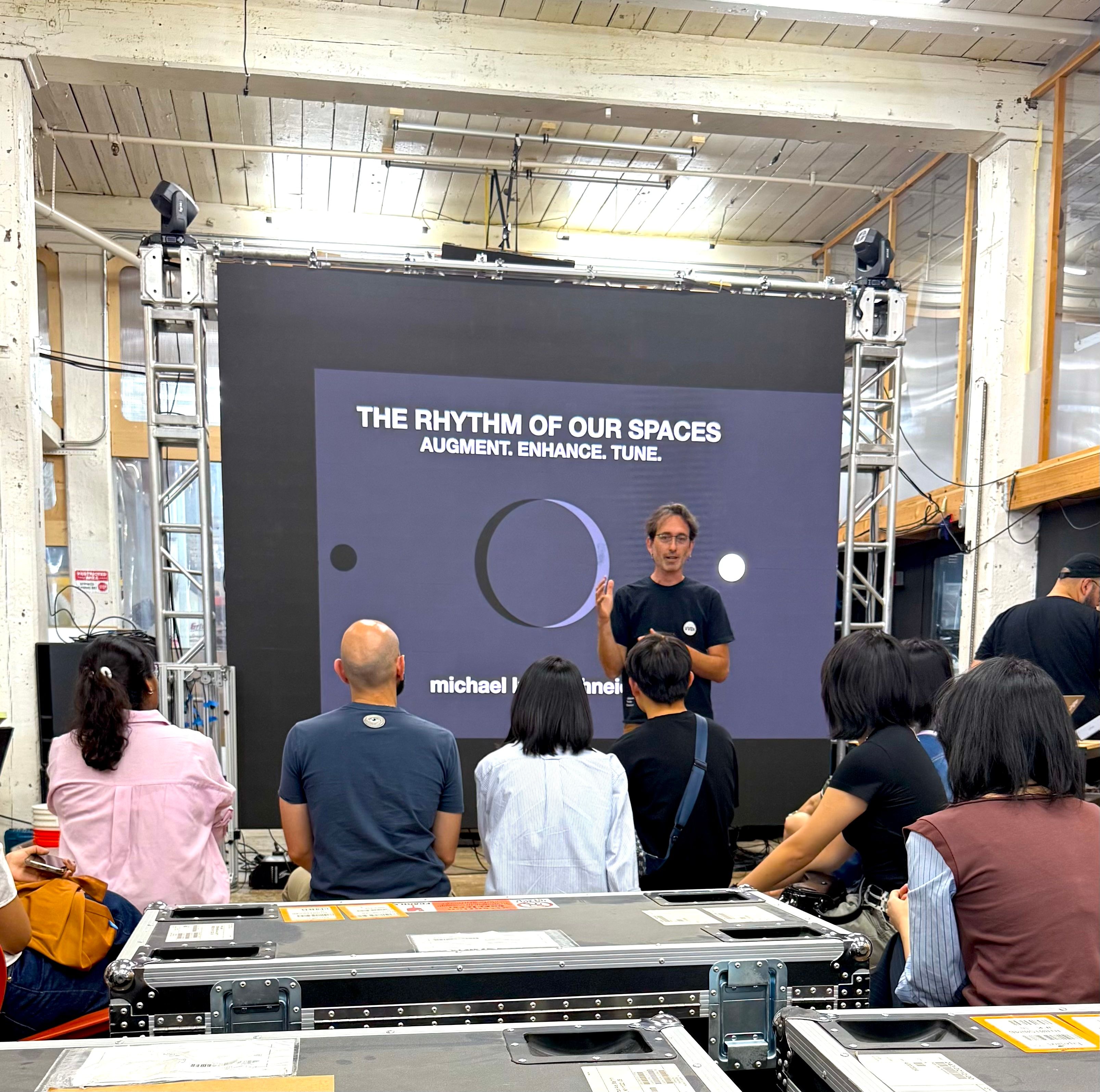 Michael at Volvox Labs presenting work to the ixD students. 