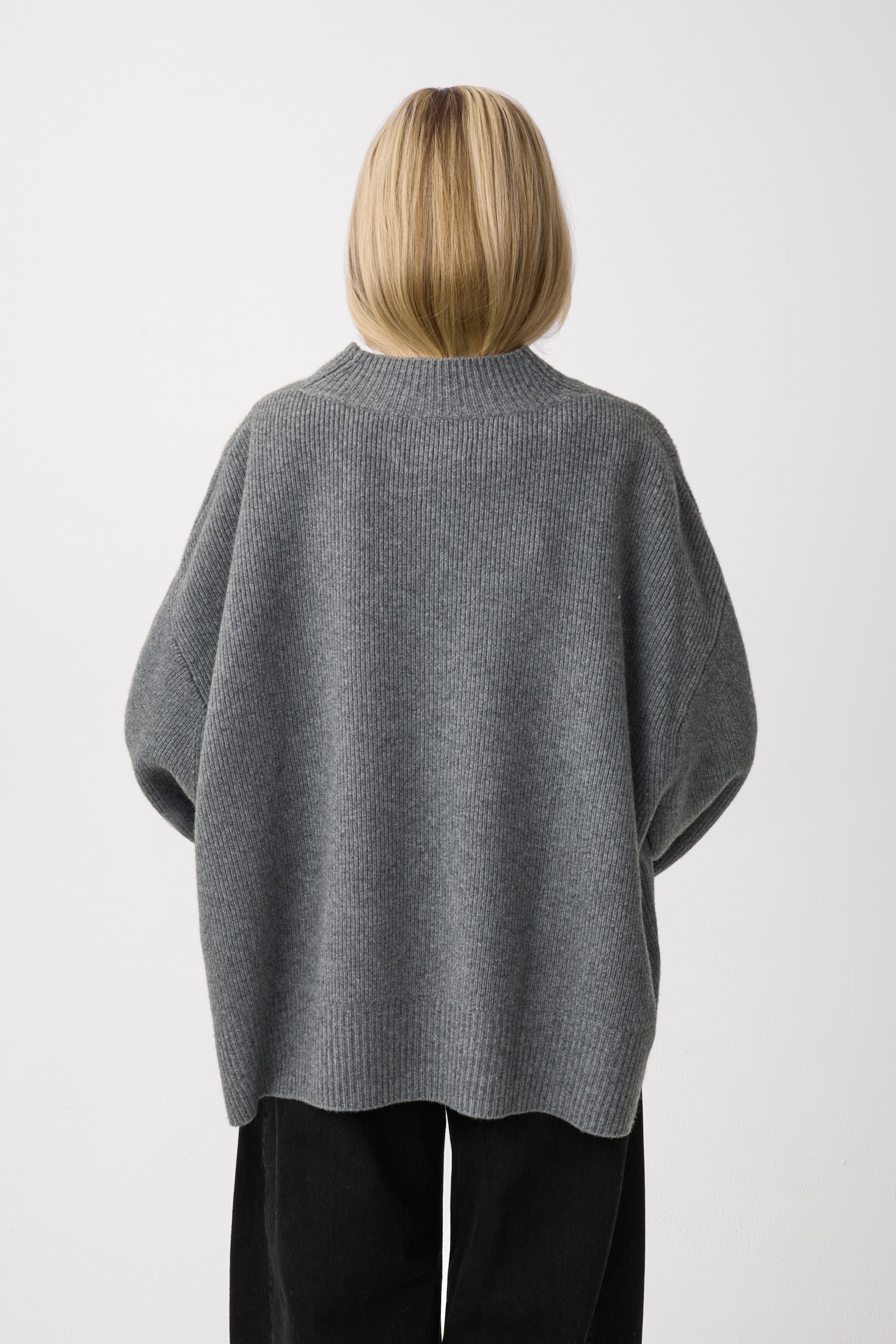 Model wearing Plateau Frame Oversized Sweater Grey Camo