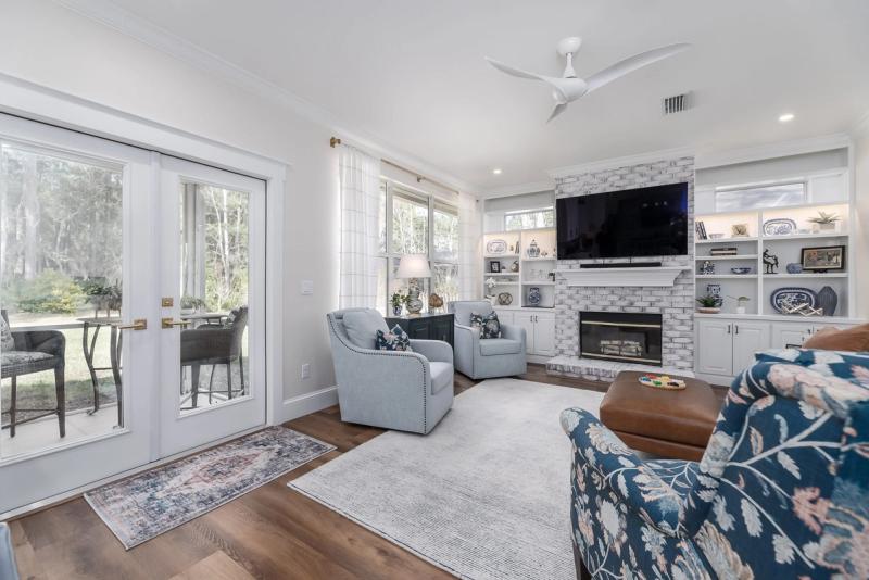 Open Concept Living Area with Fireplace and Built-Ins