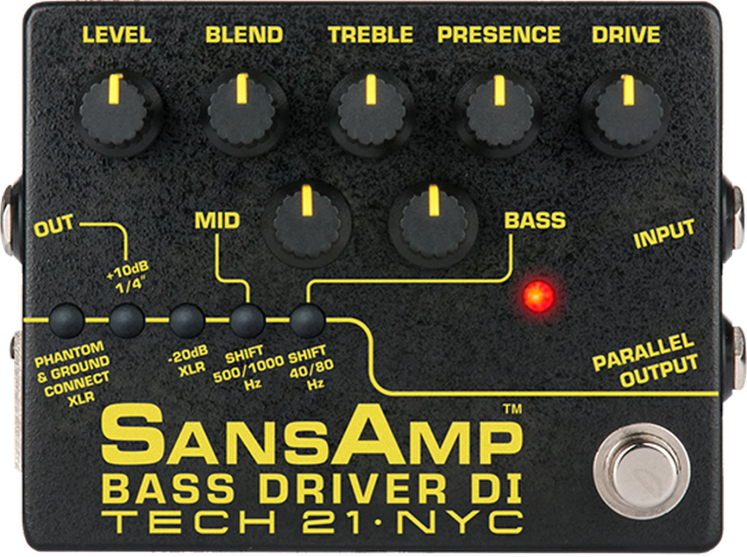 Tech 21 SansAmp Bass Driver DI, top view, black enclosure with yellow labels, six knobs, Mid and Bass shift switches, footswitch