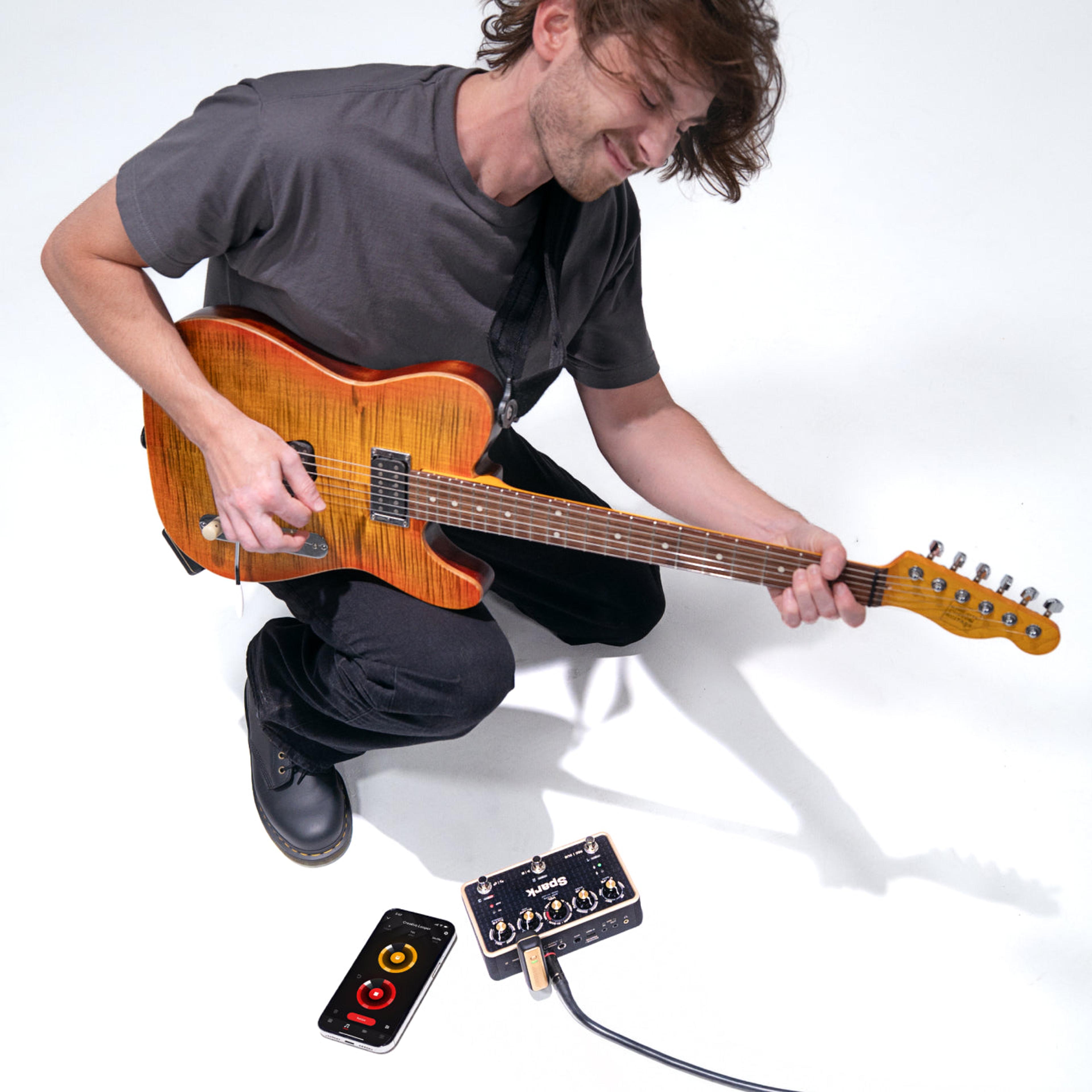 Positive Grid Spark PEDAL, angled view showing top panel and side jacks