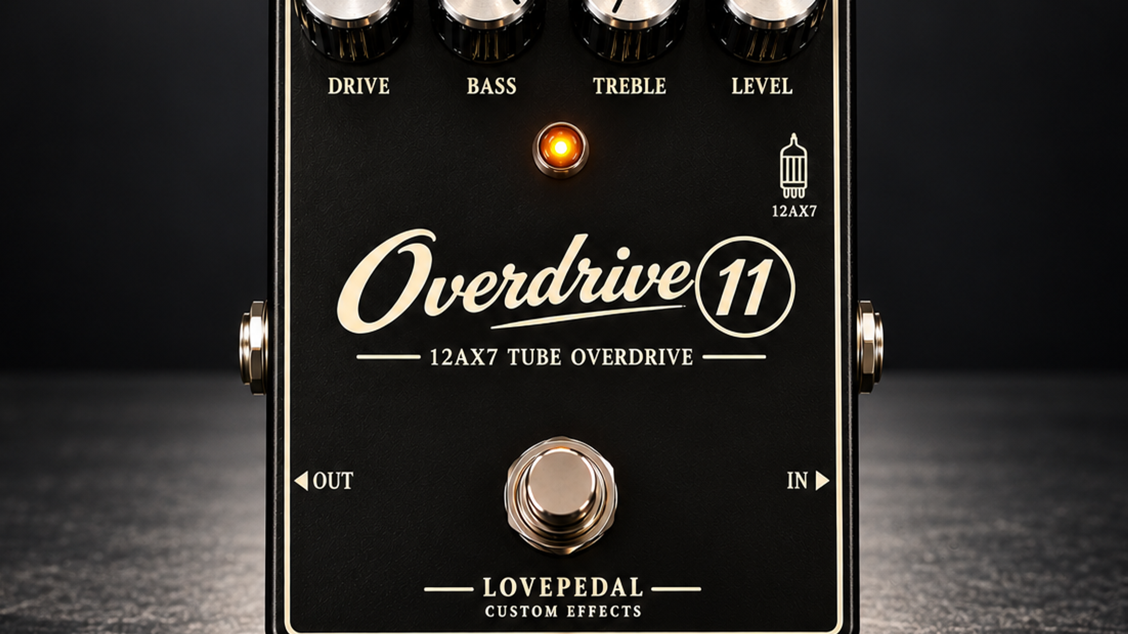 Lovepedal Overdrive 11, front view, black enclosure with Drive, Bass, Treble and Level knobs, a footswitch and 12AX7 tube overdrive lettering