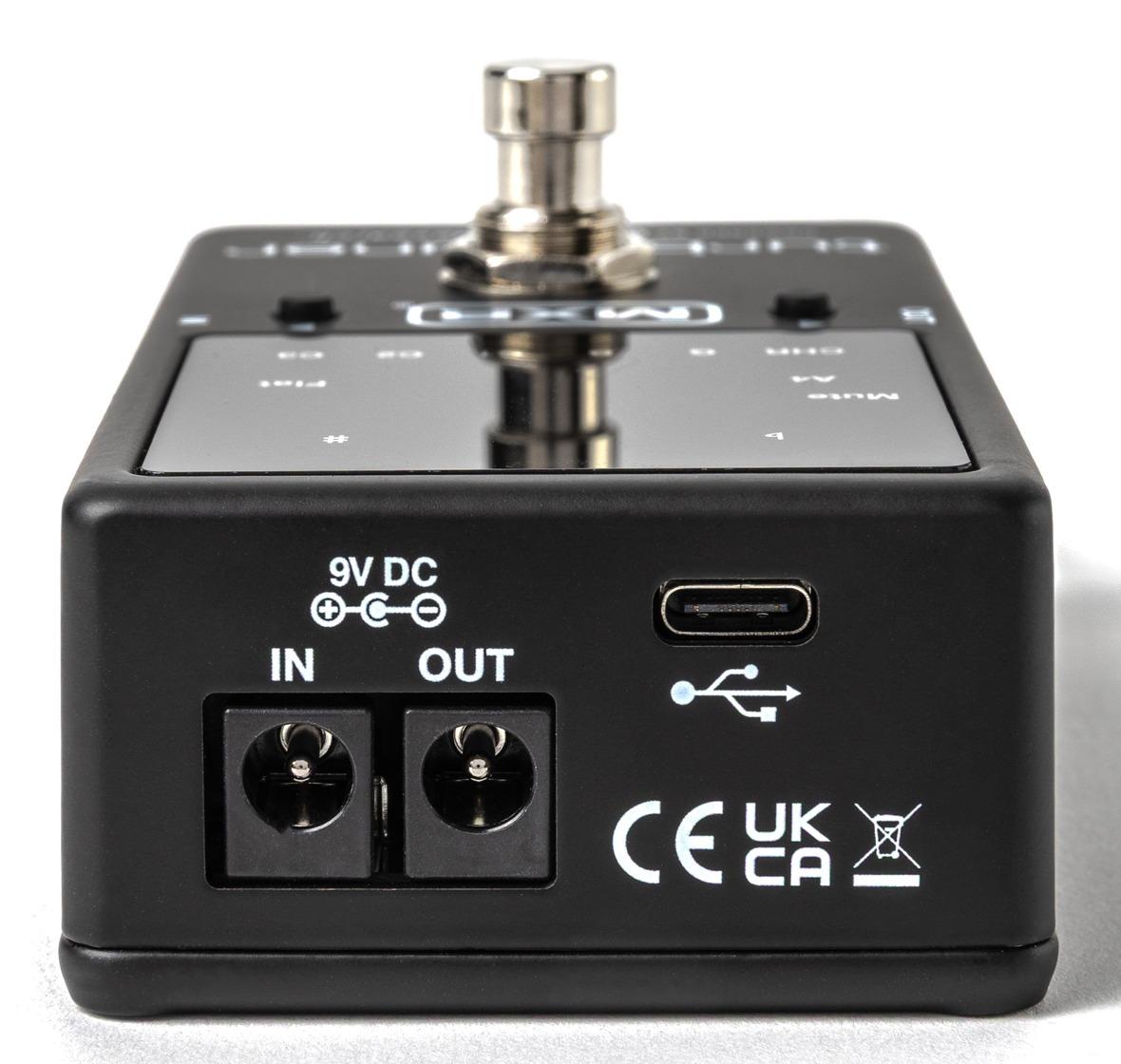 MXR Turbo Tuner M400, top end view with 9 V DC in and out jacks, a USB-C port and the chrome footswitch behind