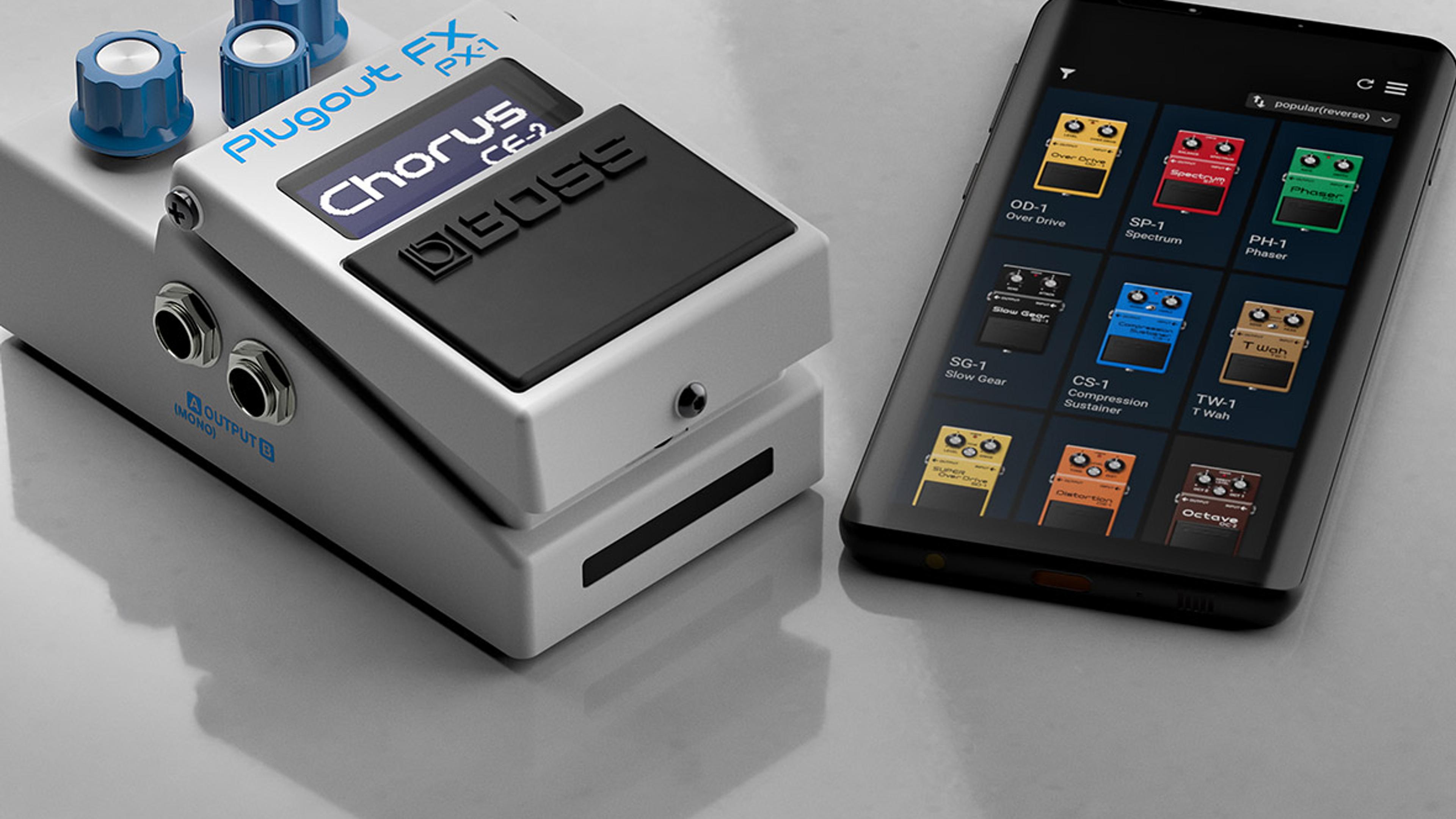 BOSS PX-1 Plugout FX showing CE-2 Chorus on its display, lying beside a smartphone with a grid of BOSS compact pedal models on screen