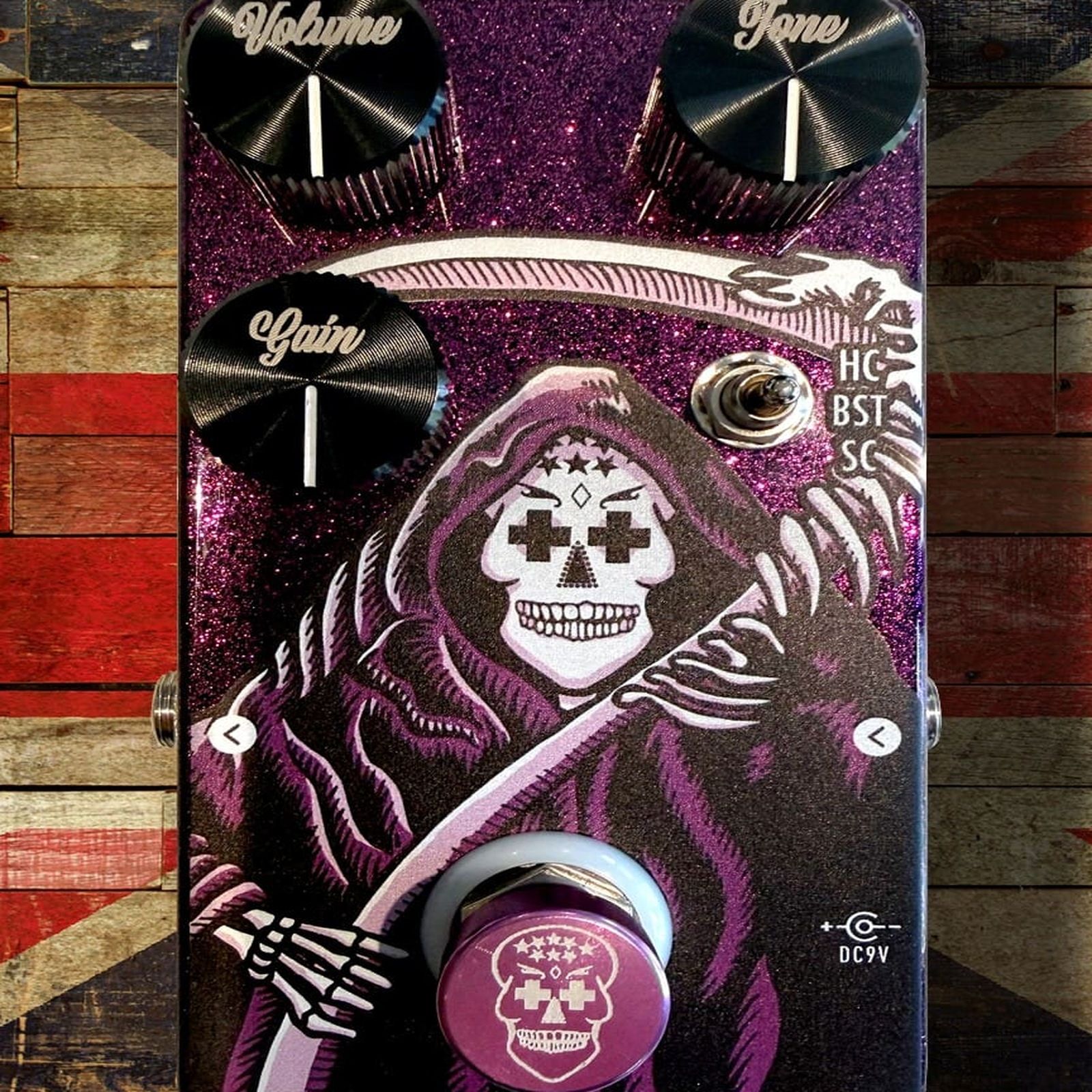 Flattley Reaper 10 AE on weathered Union Jack wooden planks, lifestyle scene