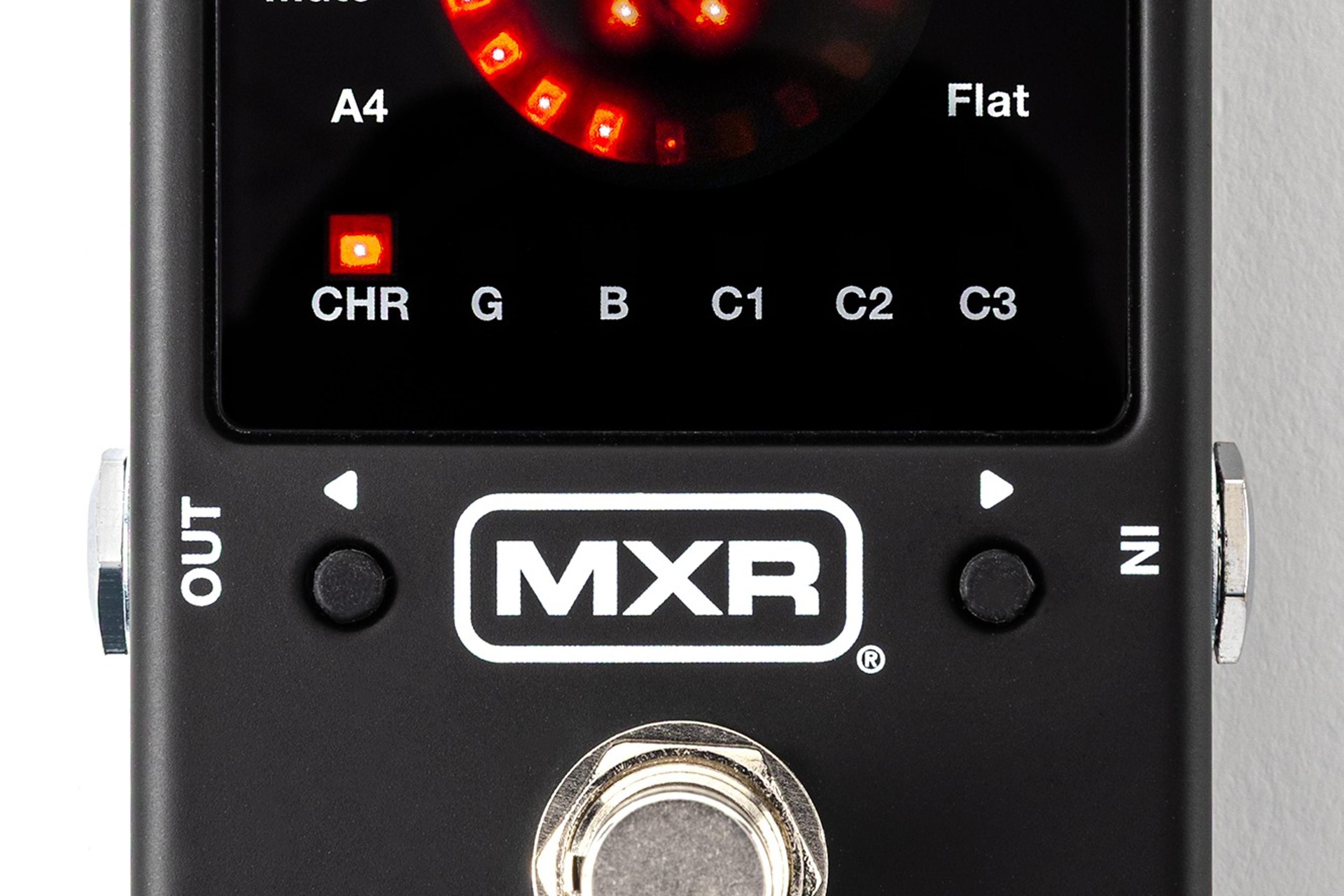 MXR Turbo Tuner M400 from above on white, black enclosure with the red strobe ring and note display lit, MXR badge over a chrome footswitch